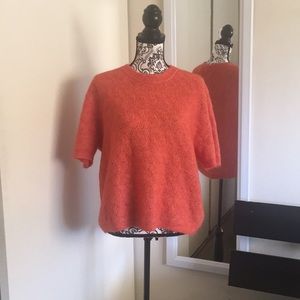 Pretty orange sweater!